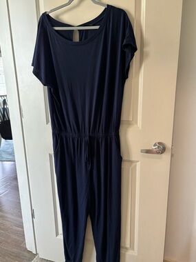 Navy Blue Jogger style Casual Jumpsuit with elastic waist and tie.